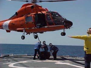 HH 65 16 coming on board jpg 300x225 - Genesis of the Coast Guard HH-65 Helicopter