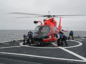 HH 65 on WHEC 300x225 - Genesis of the Coast Guard HH-65 Helicopter