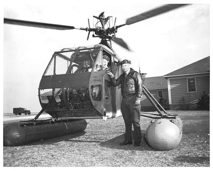 CDR Erickson Standing – LT Bolton in the helicopter