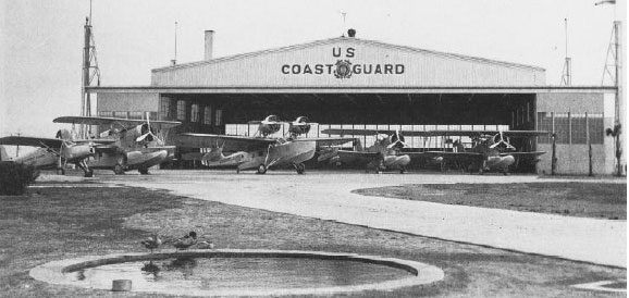 Ramp area at Coast Guard Air Station Charleston: Aircraft left to right -- J2K, JF-2, RD-4, JF-2, and JF-2